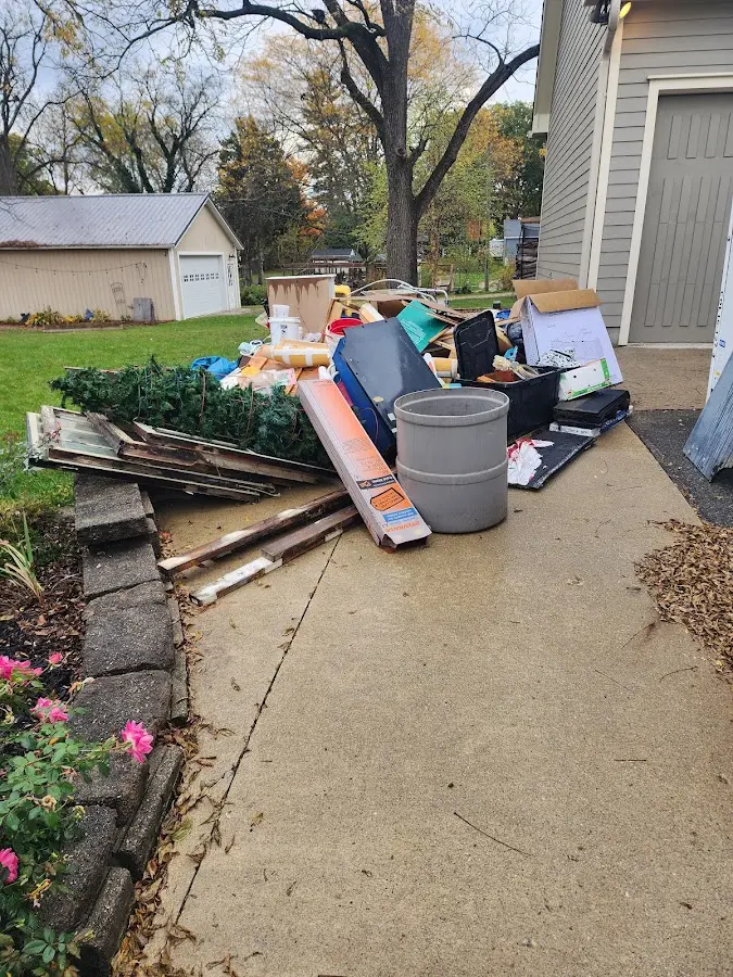 Dumpster being loaded with debris for 30 Yard Dumpster Rental in Canandaigua
